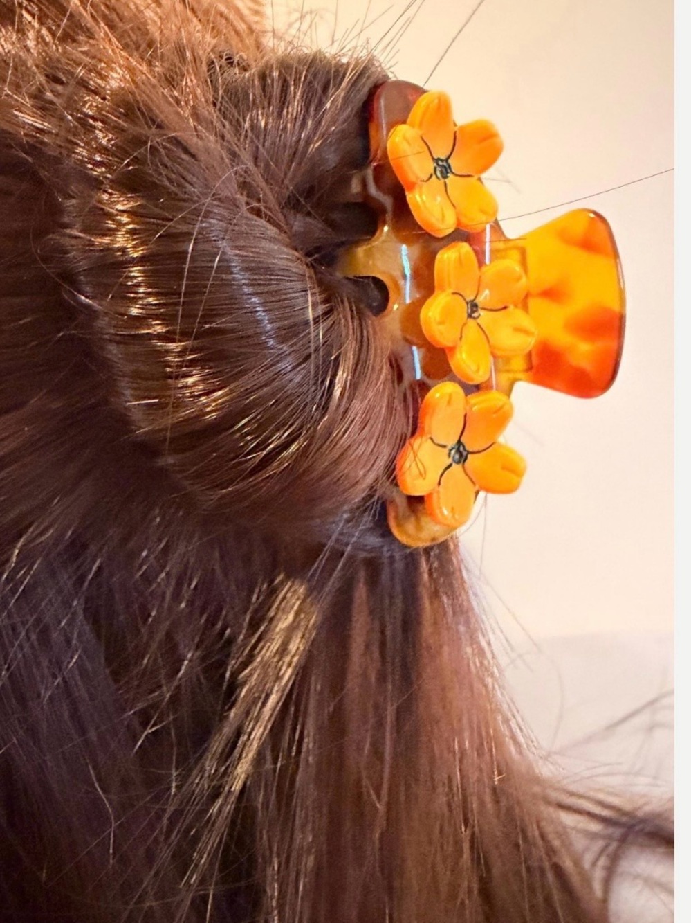 Tortoise shell floral hair claw inspired by the Puakenikeni flower